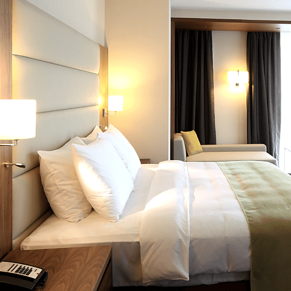 Hotel Laundry With Green Bedding 600X600